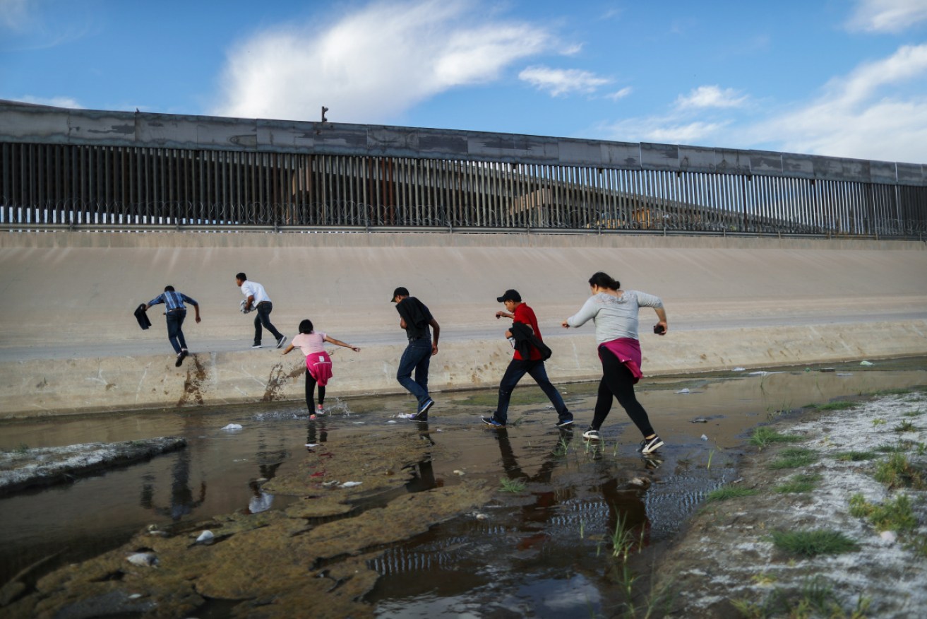 Asylum seekers crossing into the US at the Rio Grande River.