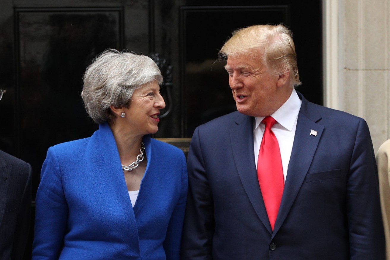  British Prime Minister Theresa May and US President Donald Trump arrive at 10 Downing street for a joint press conferance .