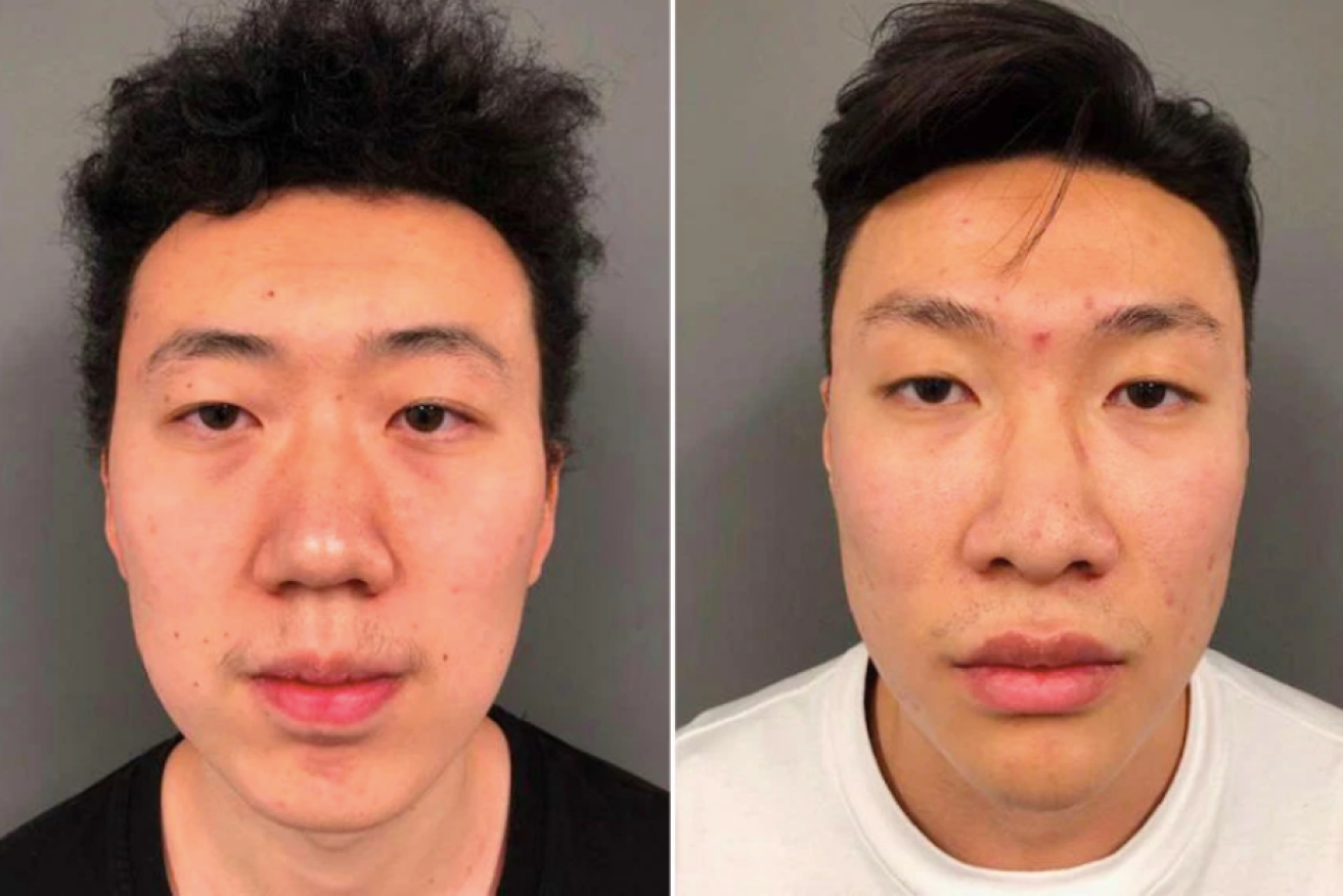 Chunyang Li (left) and Chenghan Wang pleaded not guilty to engaging in credit card fraud. 