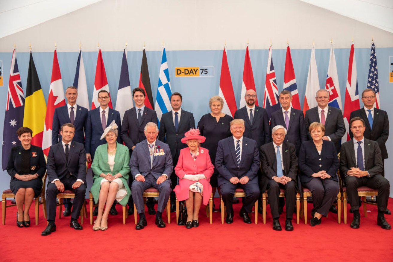 Leaders from around the world have gathered to mark 75 years since the D-Day landings, signing a joint statement agreeing to resolve world conflict peacefully. 