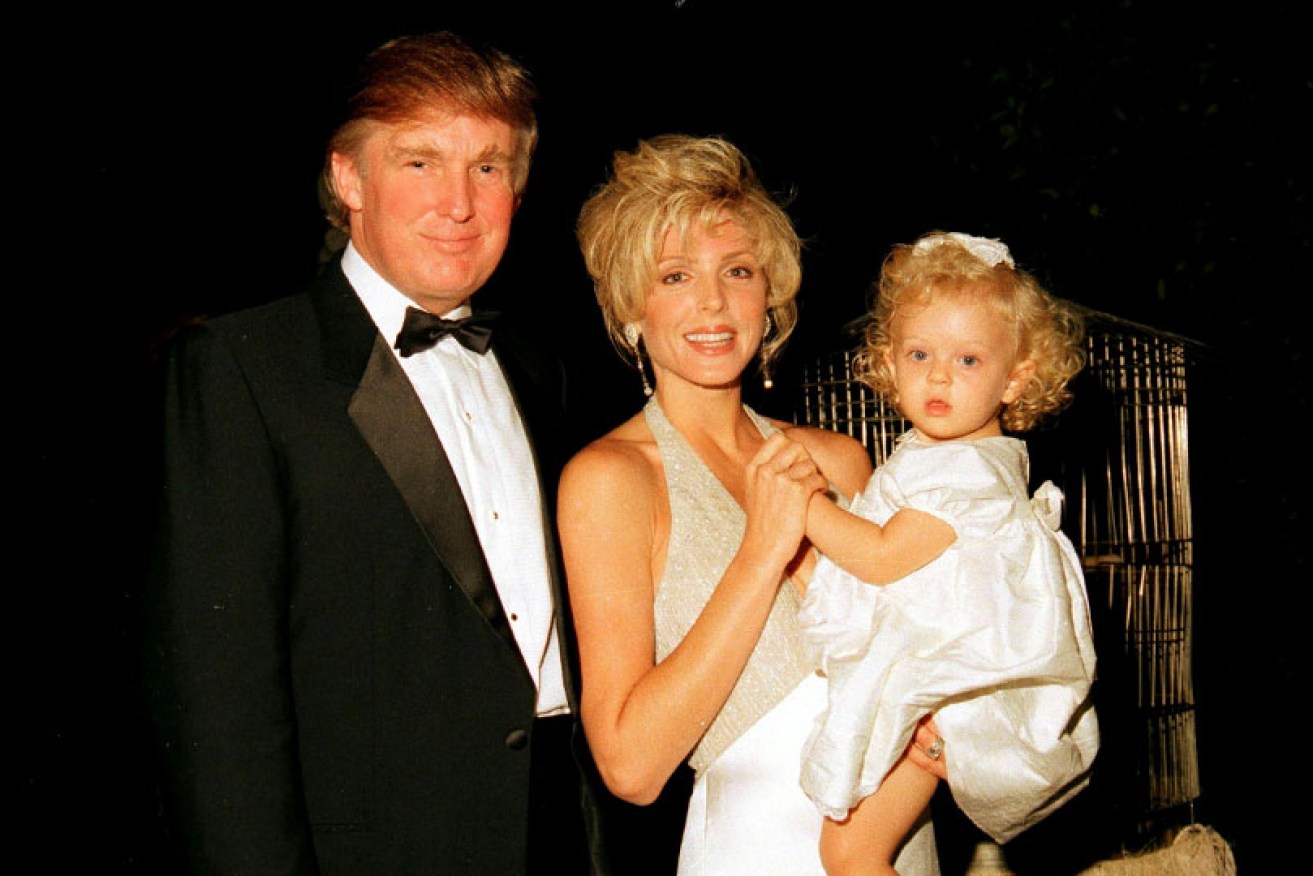 Donald Trump with then-wife Marla Maples and daughter Tiffany at the Mar-a-Lago, Florida, opening party in April 1995.