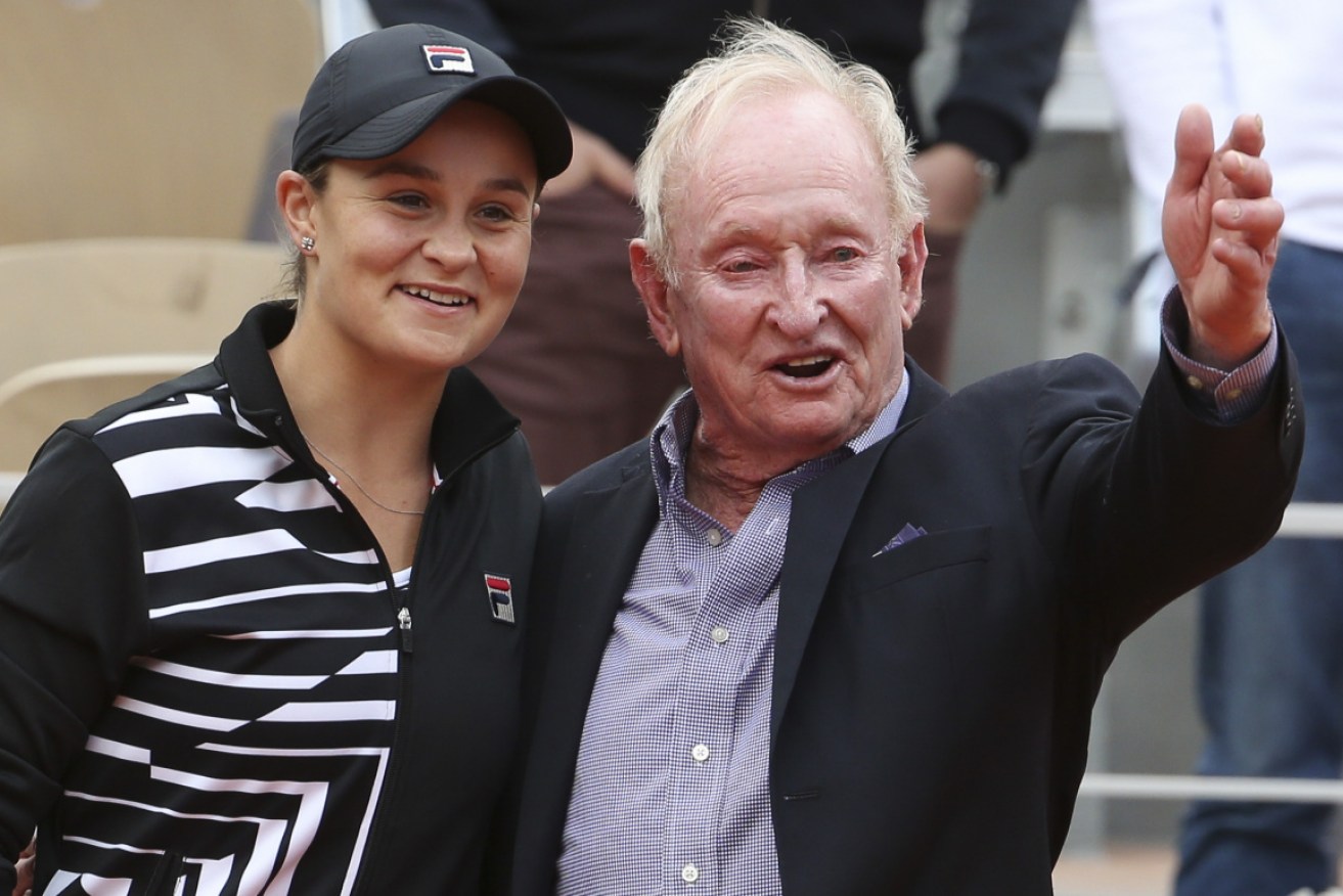 Ash Barty and Rod Laver share a moment after her Paris win. 