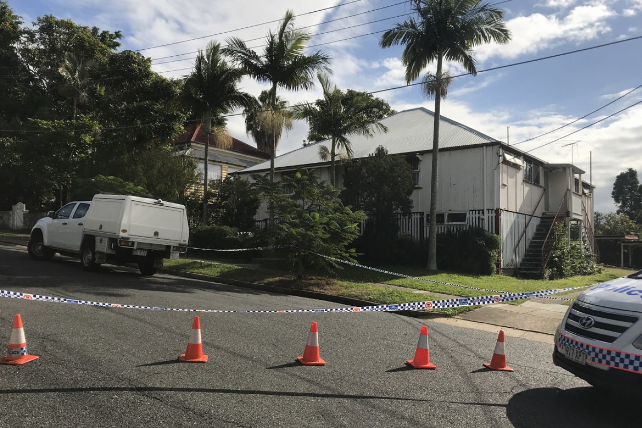 A murder investigation is underway after a man was found with fatal stabbing injuries on a footpath in inner Brisbane.