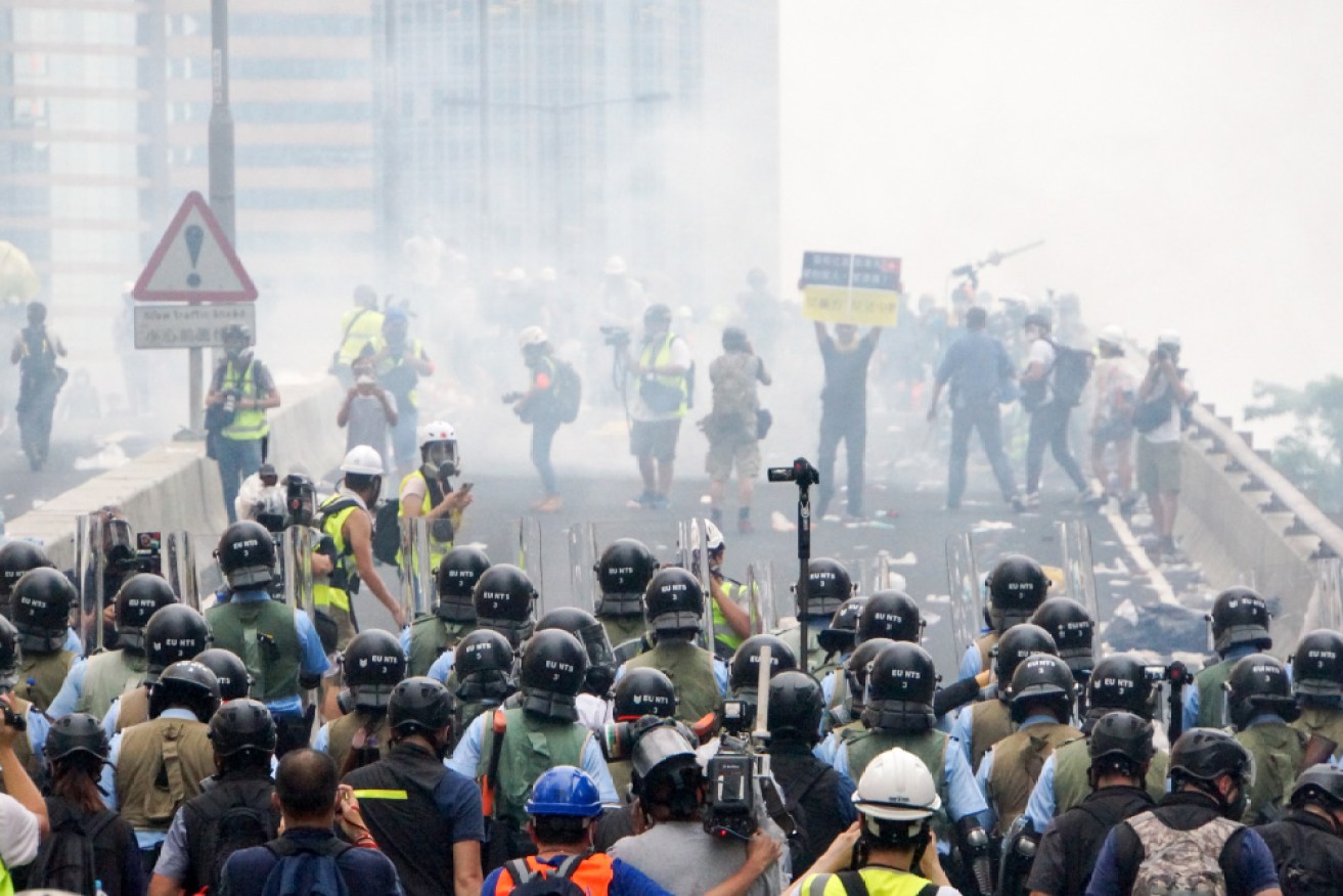 Police in Hong Kong confront protesters on June 12.