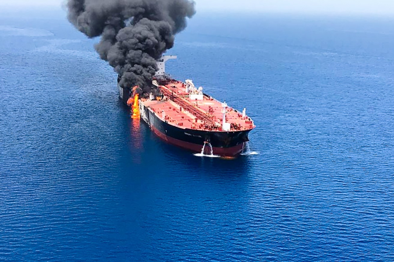 One of the two tankers on fire last week. The US is to send more troops to the region.