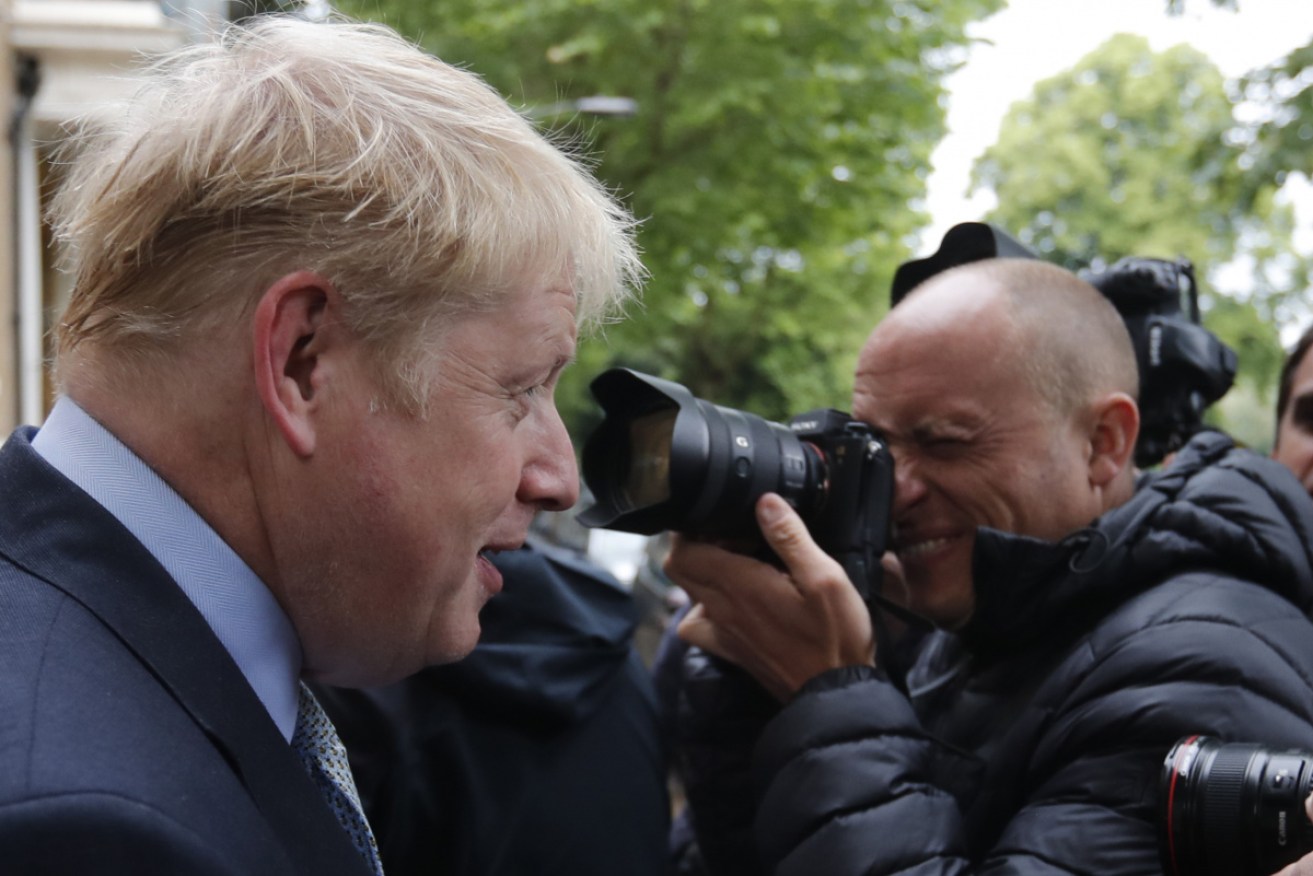 Boris Johnson leave his home for the vote at Westminster.