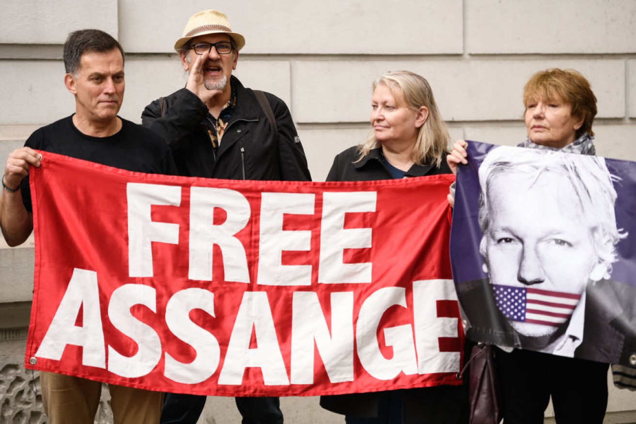 Supporters of the WikiLeaks founder Julian Assange gather outside a London court on June 14. 