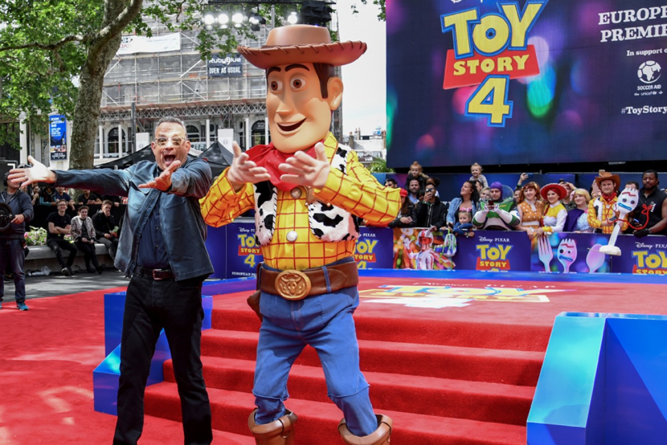 Tom Hanks goes large with Woody at the <i>Toy Story 4</i> European premiere in London on June 16.