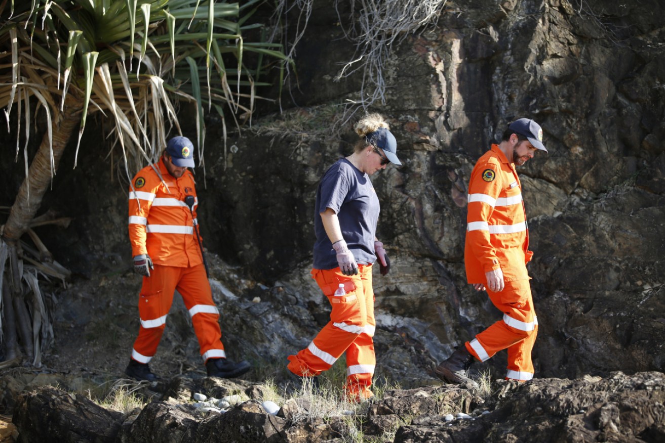 SES volunteers search around Cape Byron Lighthouse for any sign of Theo Hayez.