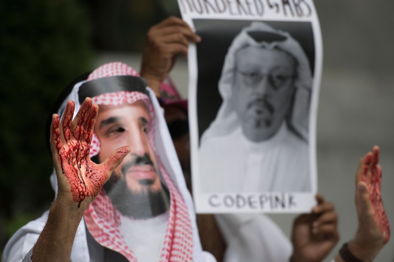 A demonstrator dressed as Crown Prince Mohammed bin Salman protests in Washington, DC in October. 