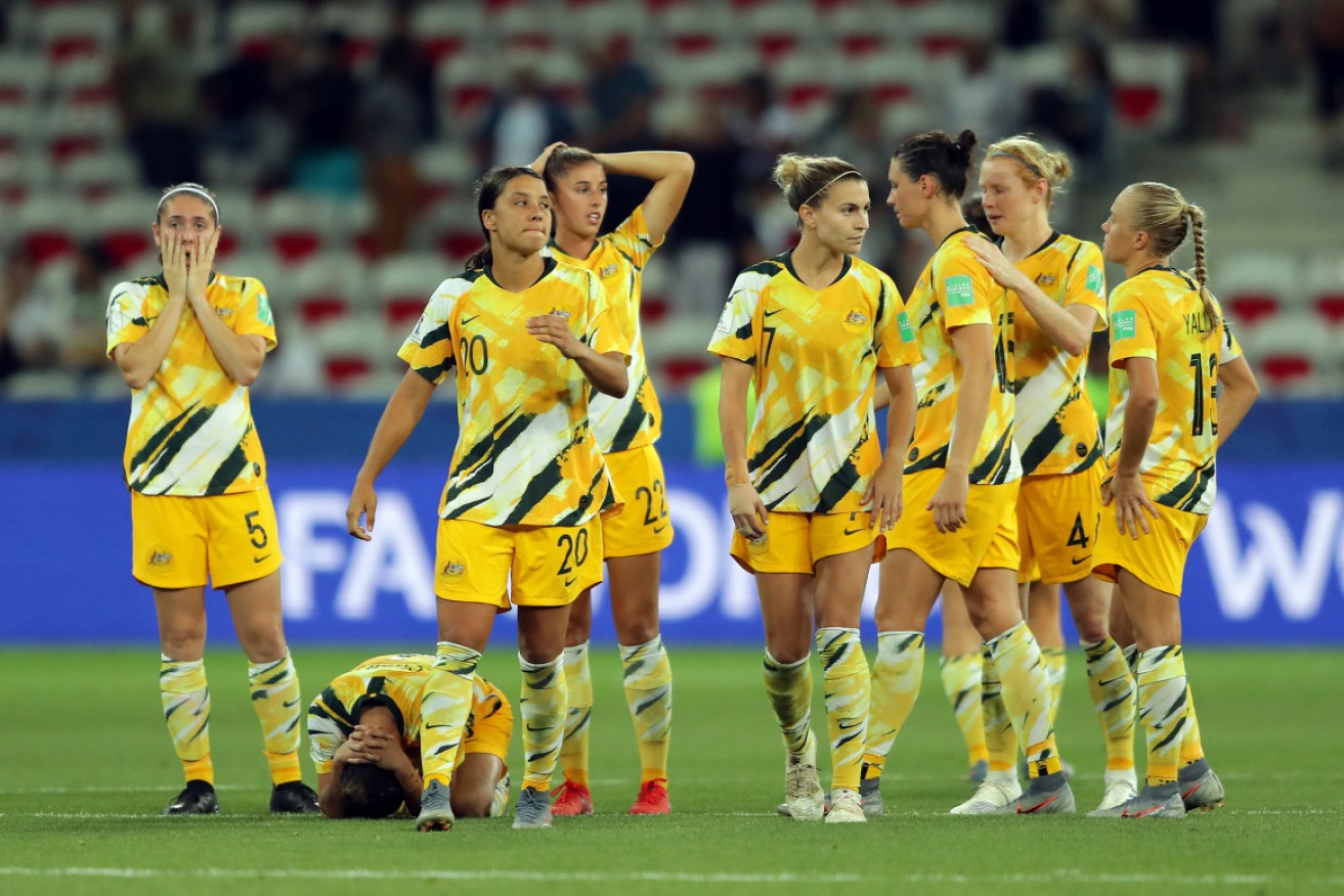 The devastated Matildas after the loss to Norway.