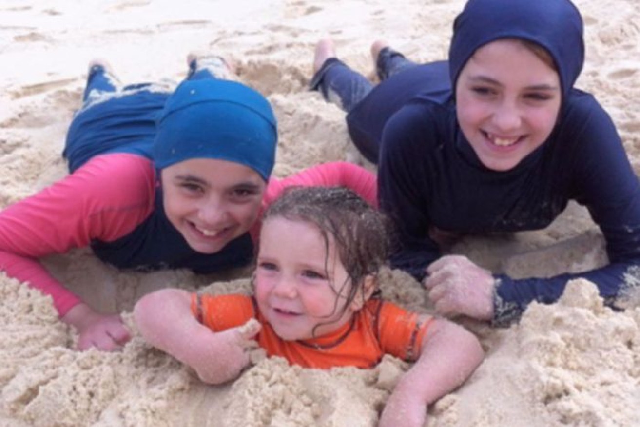Hoda, Humzeh and Zaynab Sharrouf at the beach in Australia before their parents took them to Syria.
