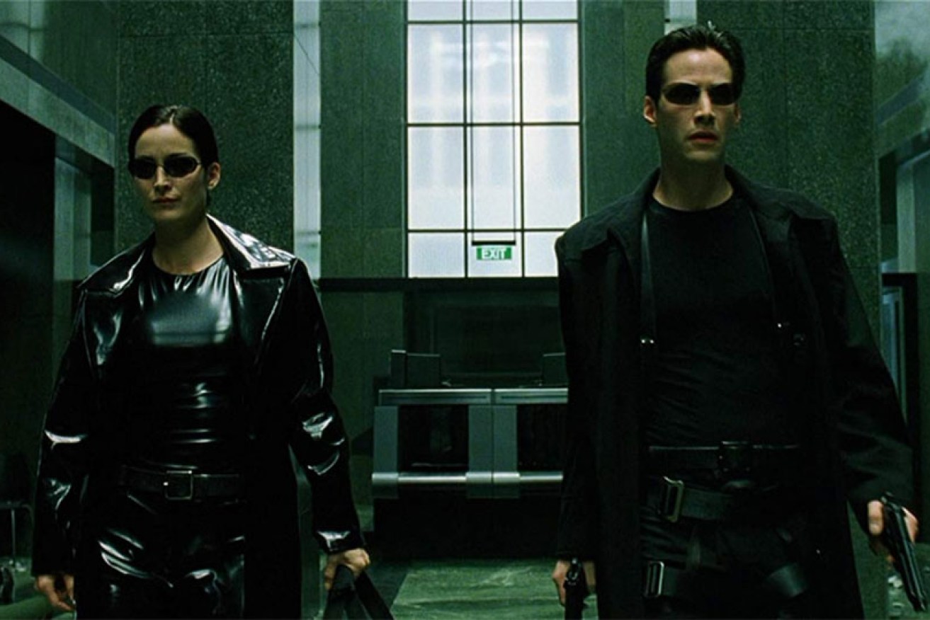 Carrie-Anne Moss and Keanu Reeves get righteous in <i>The Matrix</i> in 1999.
