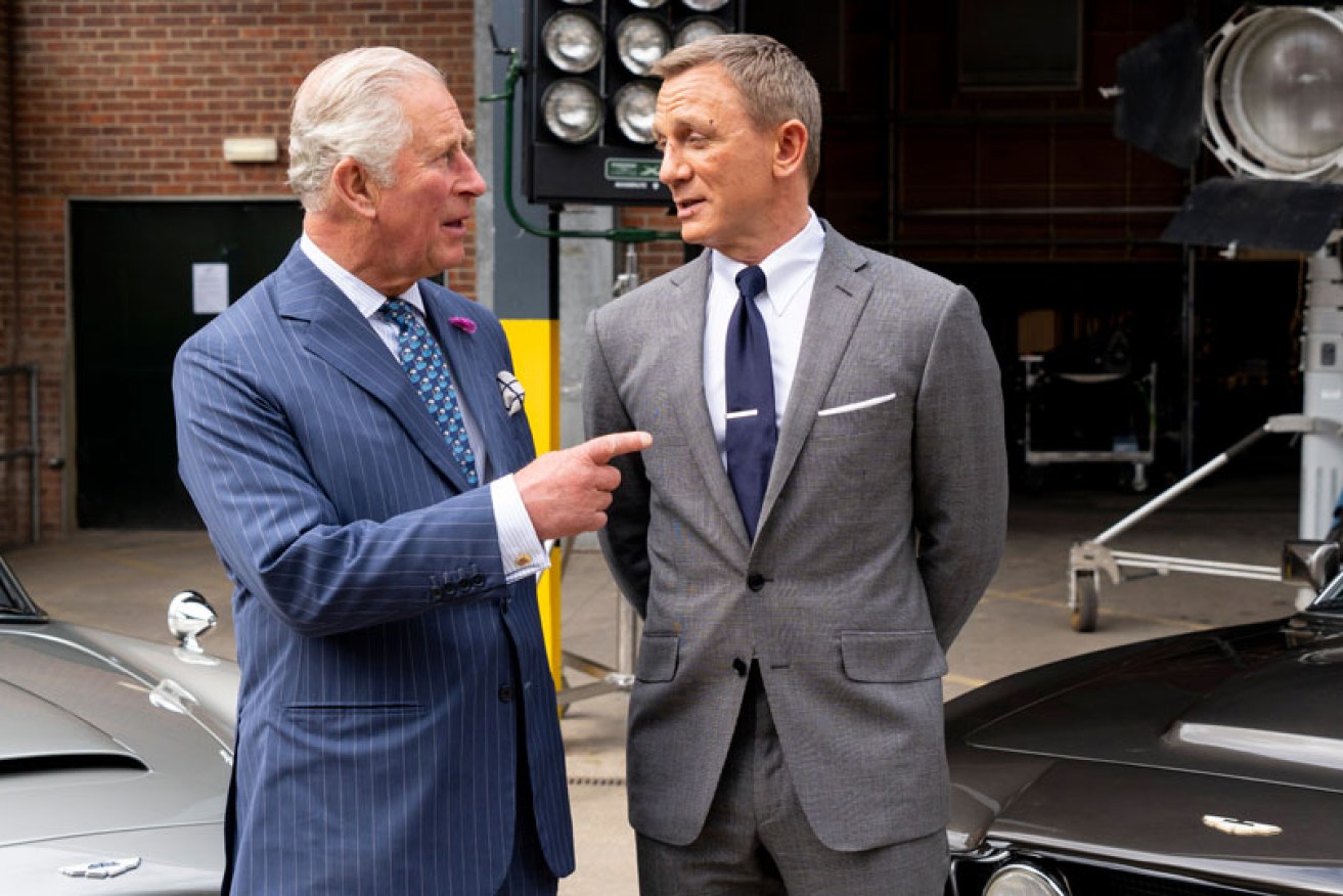 Prince Charles visits Daniel Craig on the <i>Bond 25</i> set on June 20 at England's Pinewood Studios.