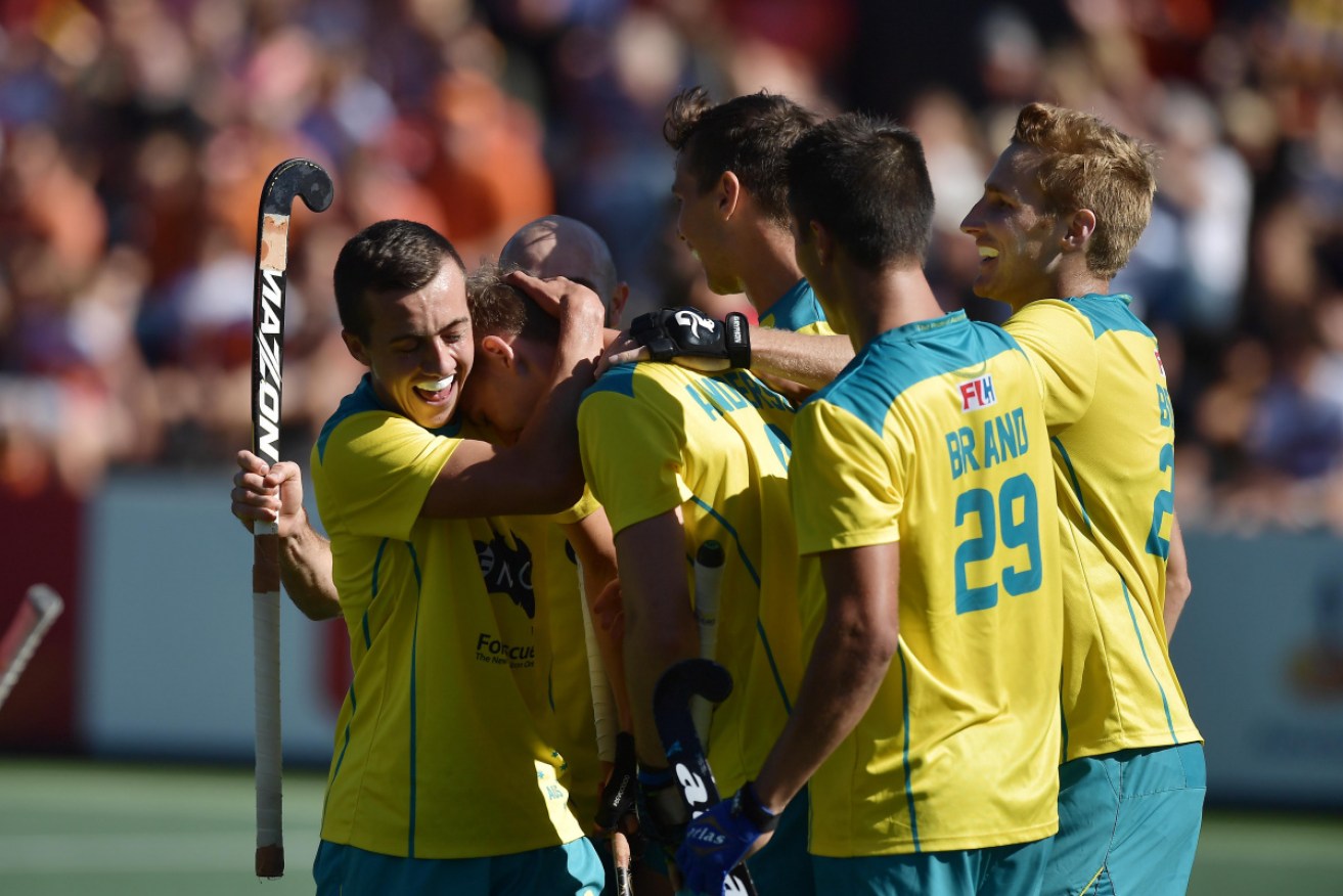 Australia has booked a place in the Men's FIH final after Jacob Anderson's stunning three-goal burst.
