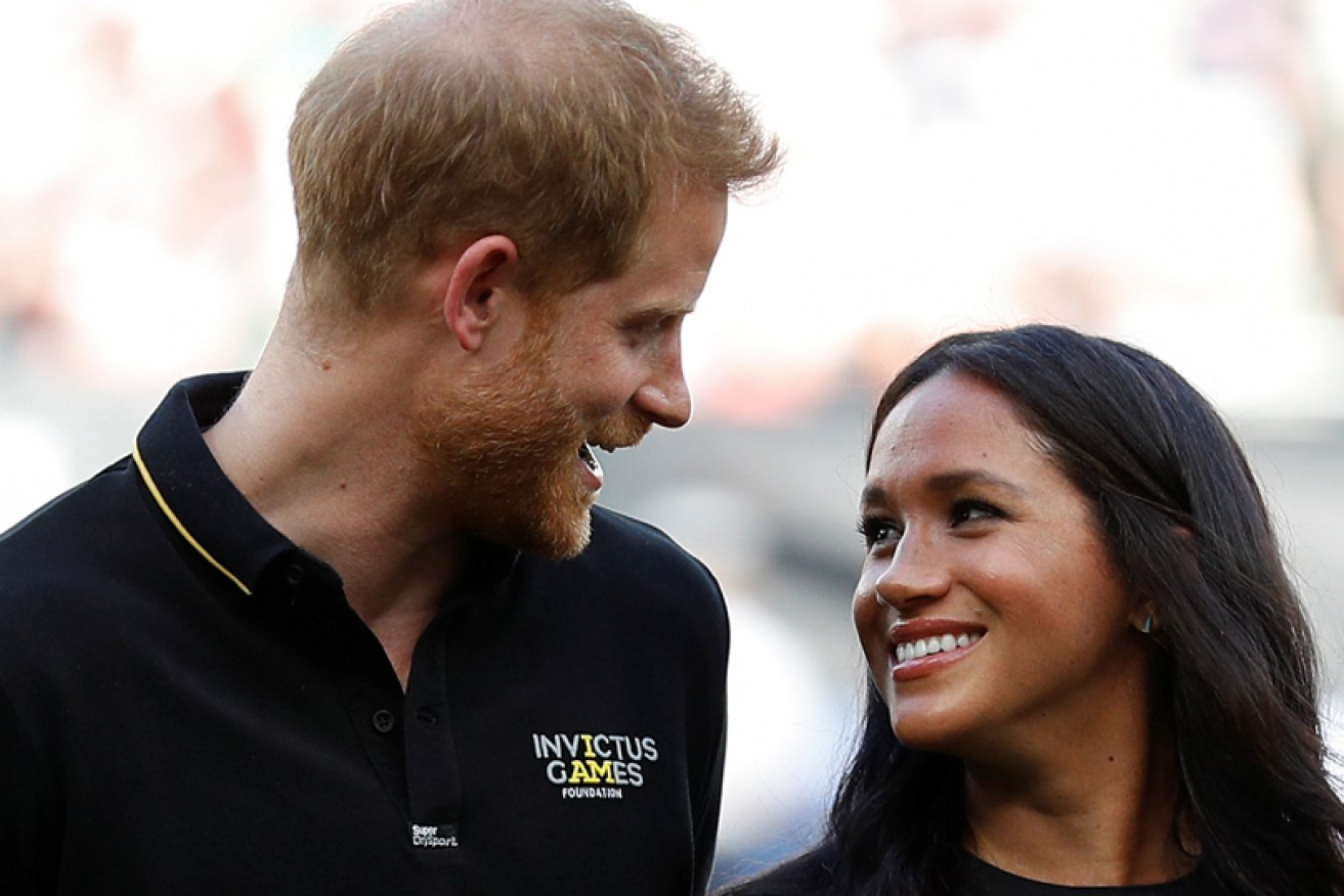 Prince Harry and Meghan Markle at London Stadium for a baseball game on June 29.