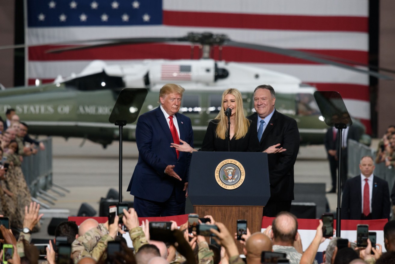 Ivanka Trump at Osan Air Base with her father and Mike Pompeo.