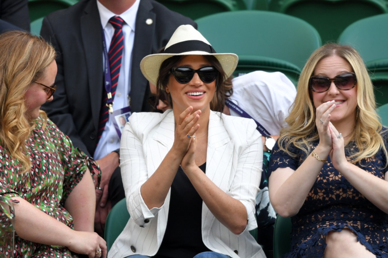 Out in public for the third time since son Archie's birth, Meghan Markle hit Wimbledon with friends on July 4.