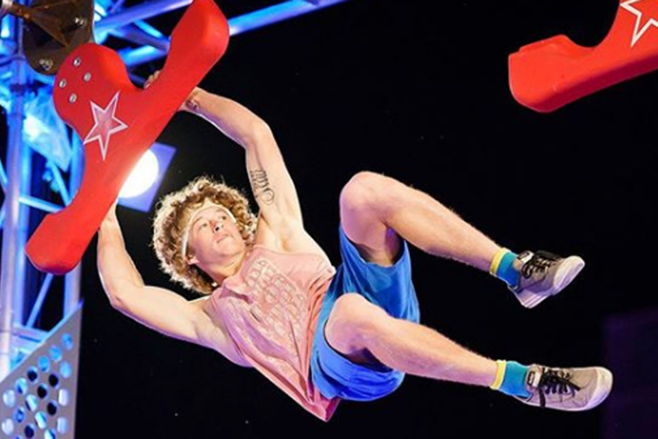 A contestant goes down swinging on <i>Australian Ninja Warrior</i> in 2018.