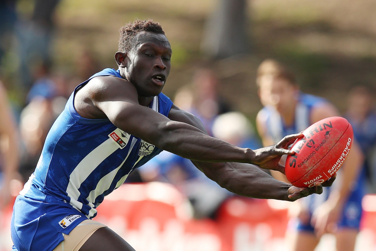 Majak Daw back in action for North Melbourne in the VFL. 