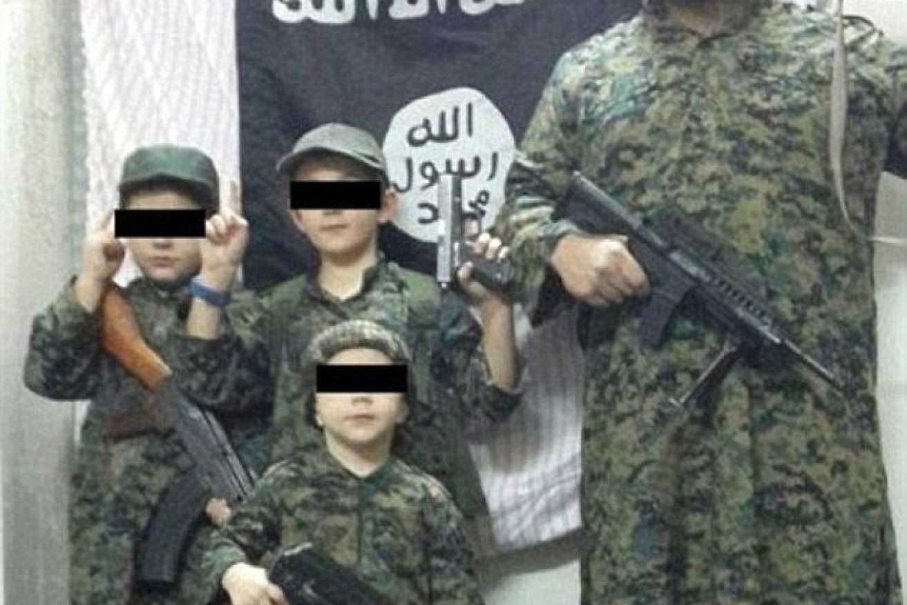 Australia cannot allow the return of the likes of dead terrorist Khaled Sharrouf, shown here with his children,  <i>Photo: ISIS</i>