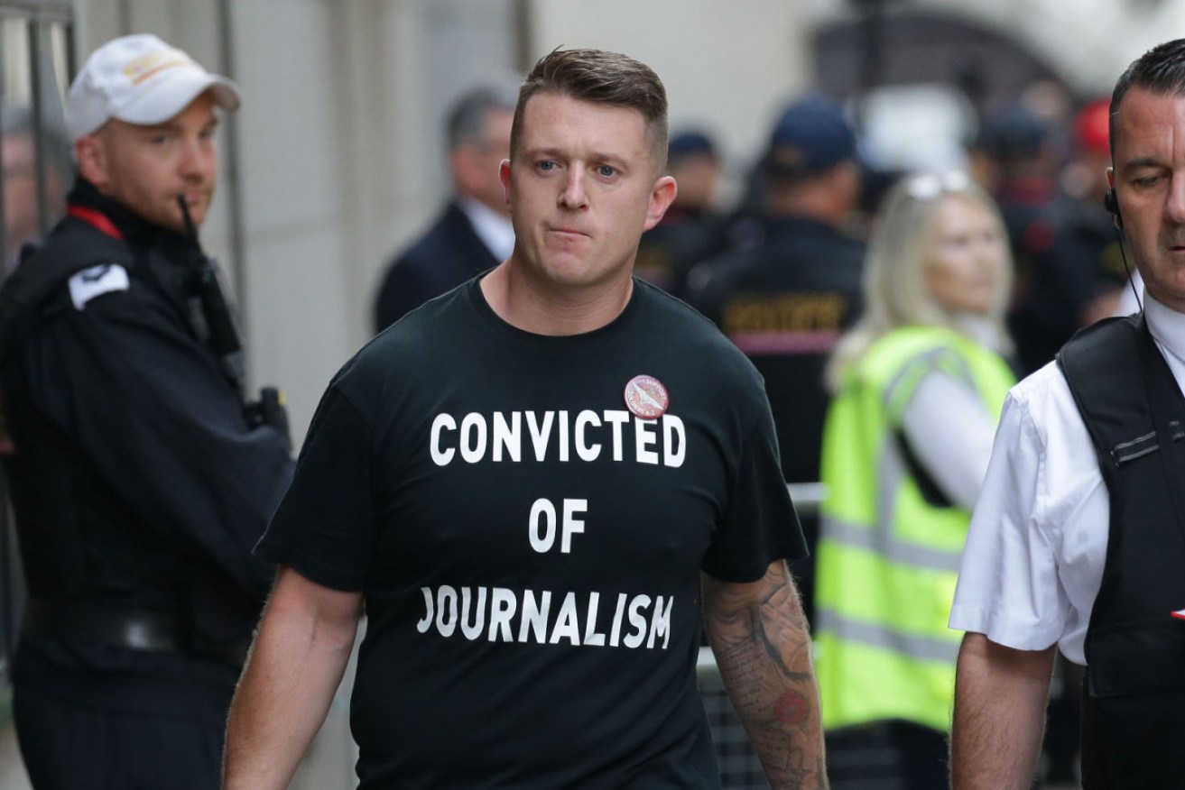 Tommy Robinson arrives at the Old Bailey in London on Thursday for sentencing. 