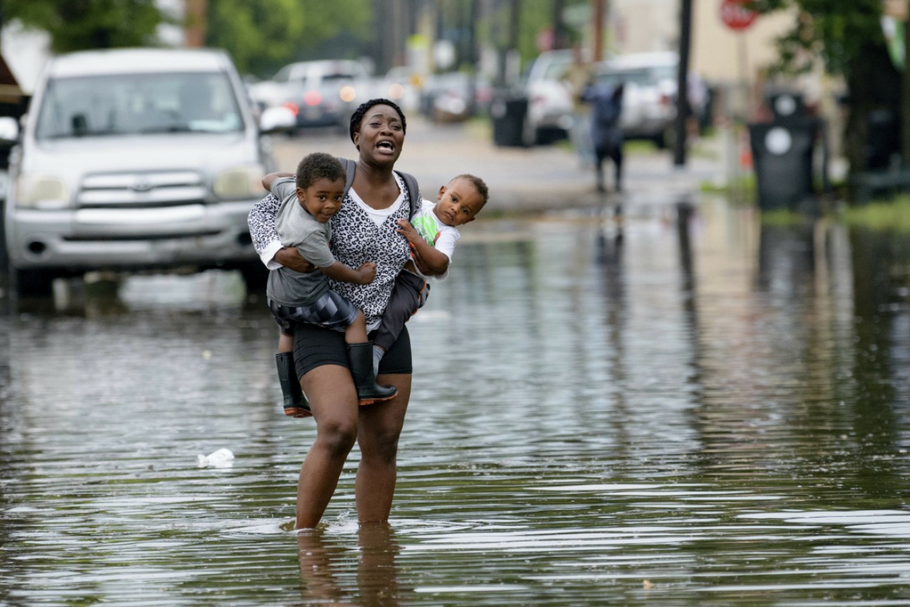 New Orleans resident Terrian Jones as flooding hits parts of the city ahead of a potential hurricane making landfall. <i>Photo: AAP</i>