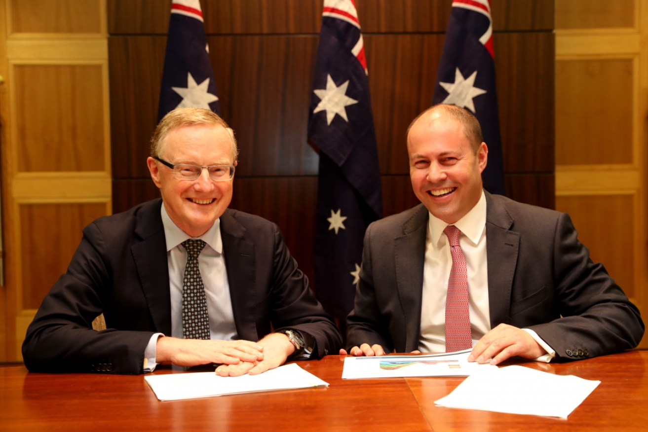 Chums? Philip Lowe and Josh Frydenberg pictured in July. 