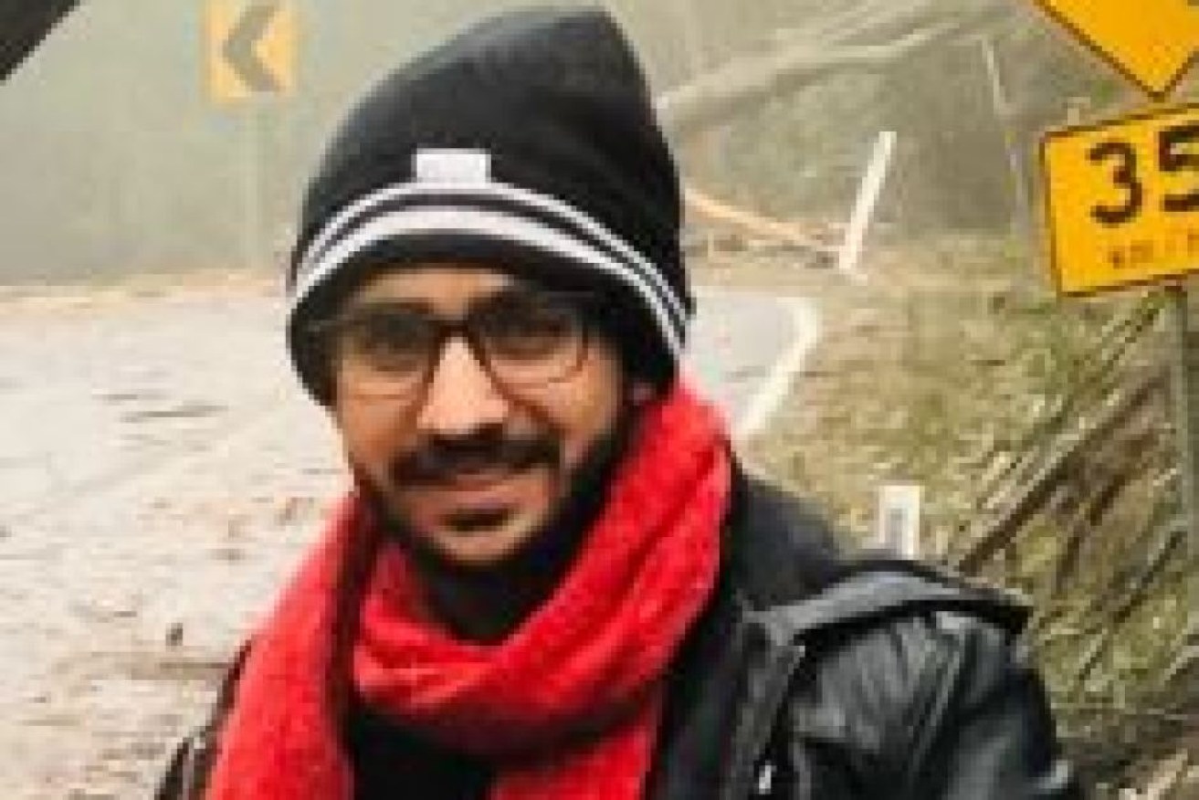 Poshik Sharma was wearing a beanie and red scarf when he was last seen.