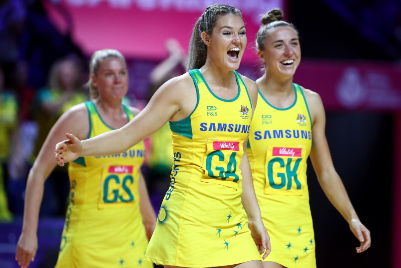 Gretel Tippett and Sarah Klau of Australia celebrate the win over New Zealand. 