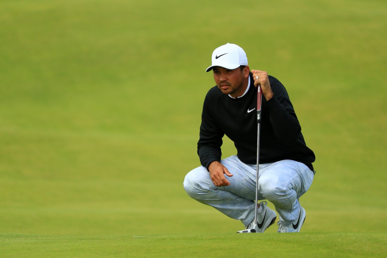 Day joined Adam Scott on the sidelines after missing the British Open cut. 
