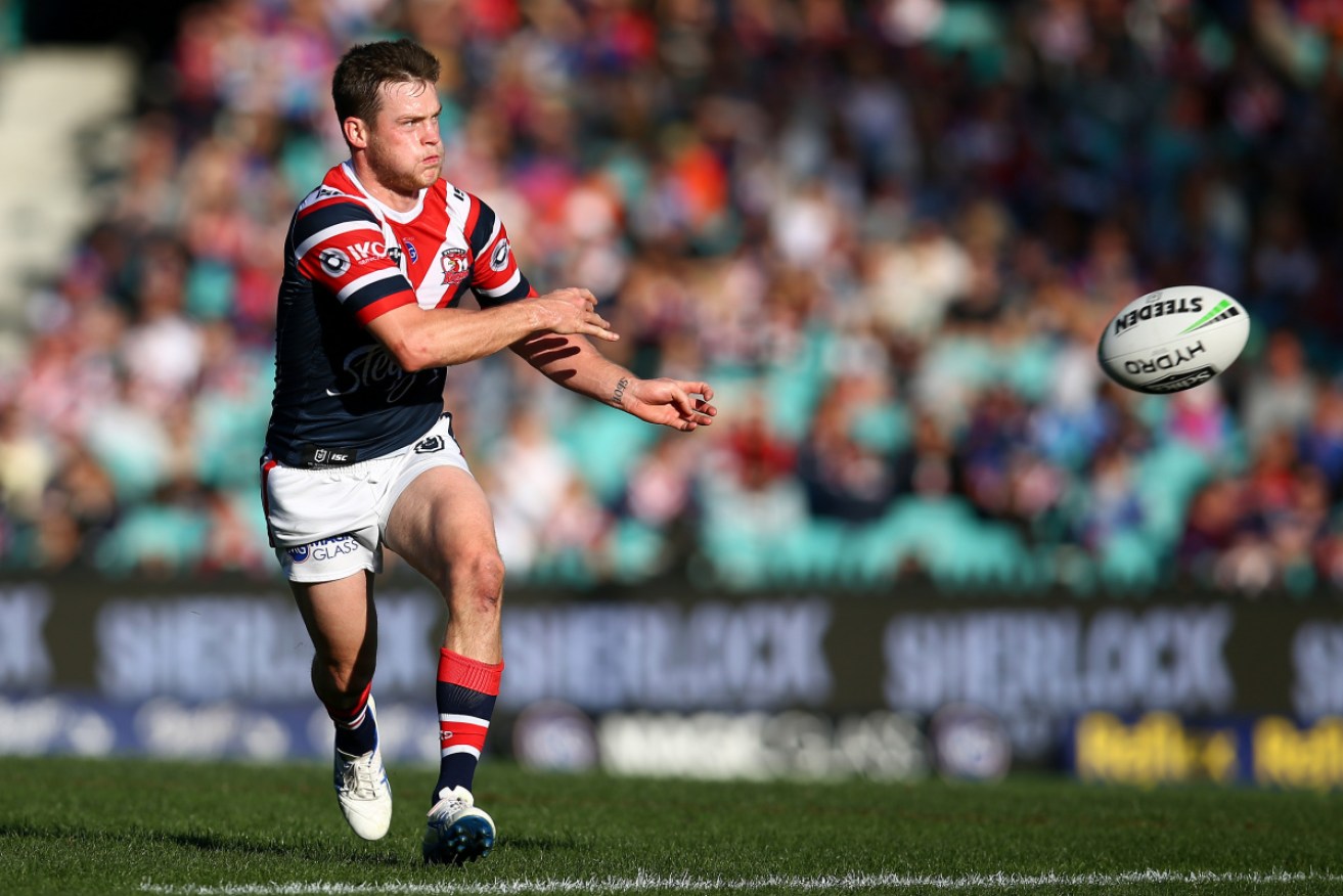 Luke Keary on the attack for the in-form Roosters.