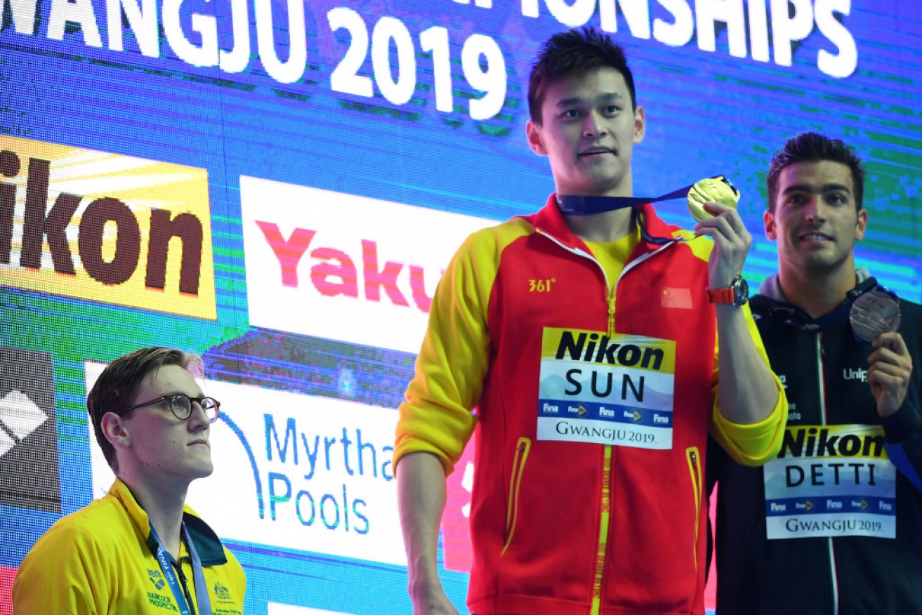 Silver medalist Mack Horton stages a bold podium protest against gold medalist Sun Yang, of China, over drug cheating claims. 