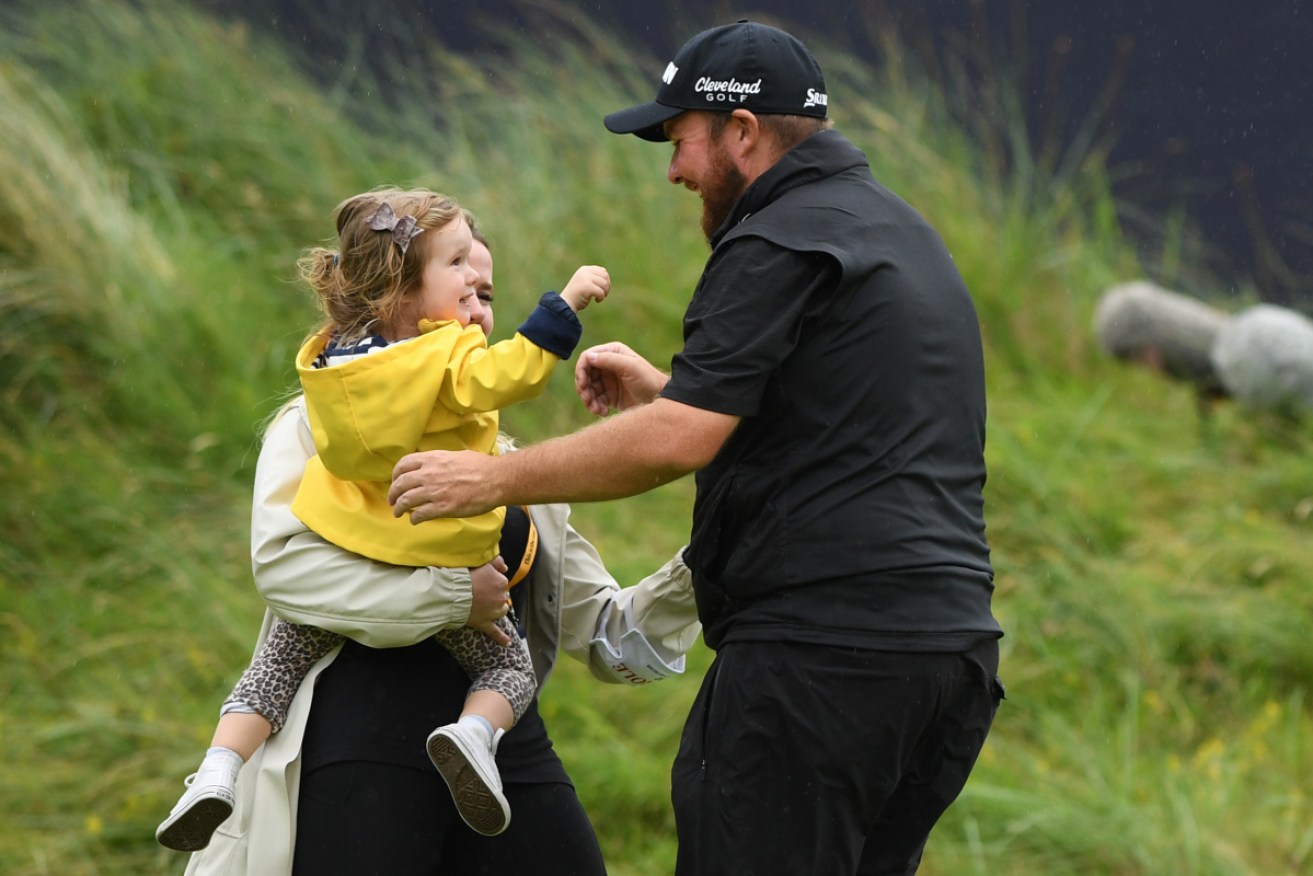 Shane Lowry greets his family after his British Open triumph. 