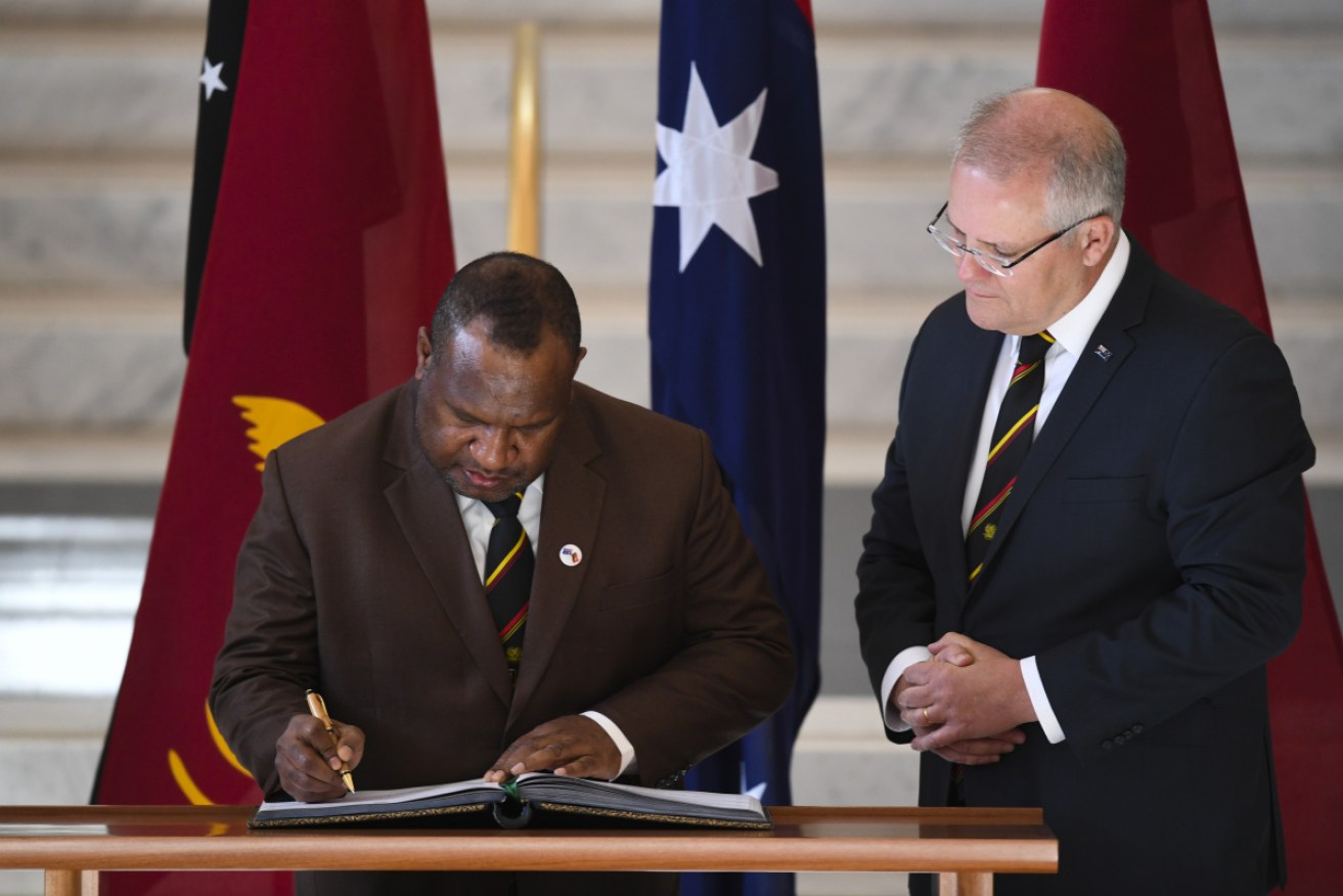 James Marape with PM Scott Morrison in Canberra on Monday.