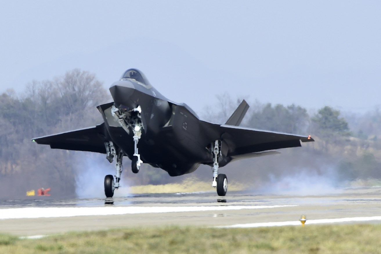 A F35-A fighter jet lands at a South Korean base.