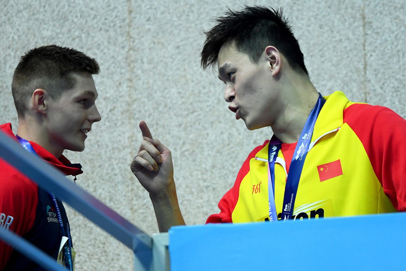 Chinese star Sun Yang  confronts British bronze medallist Duncan Scott over his podium protest.