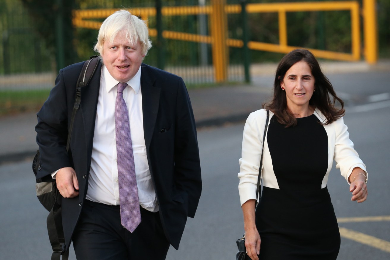 Mr Johnson with then wife Marina Wheeler when he stood for selection as an MP in 2014.