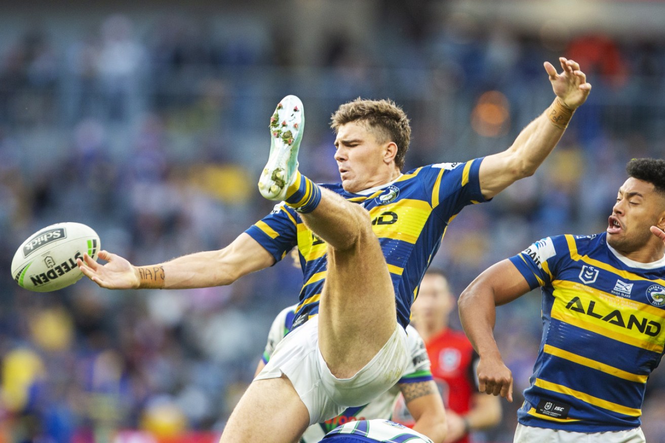 Parramatta's Ethan Parry searches for the ball during a mad moment against the Warriors. 