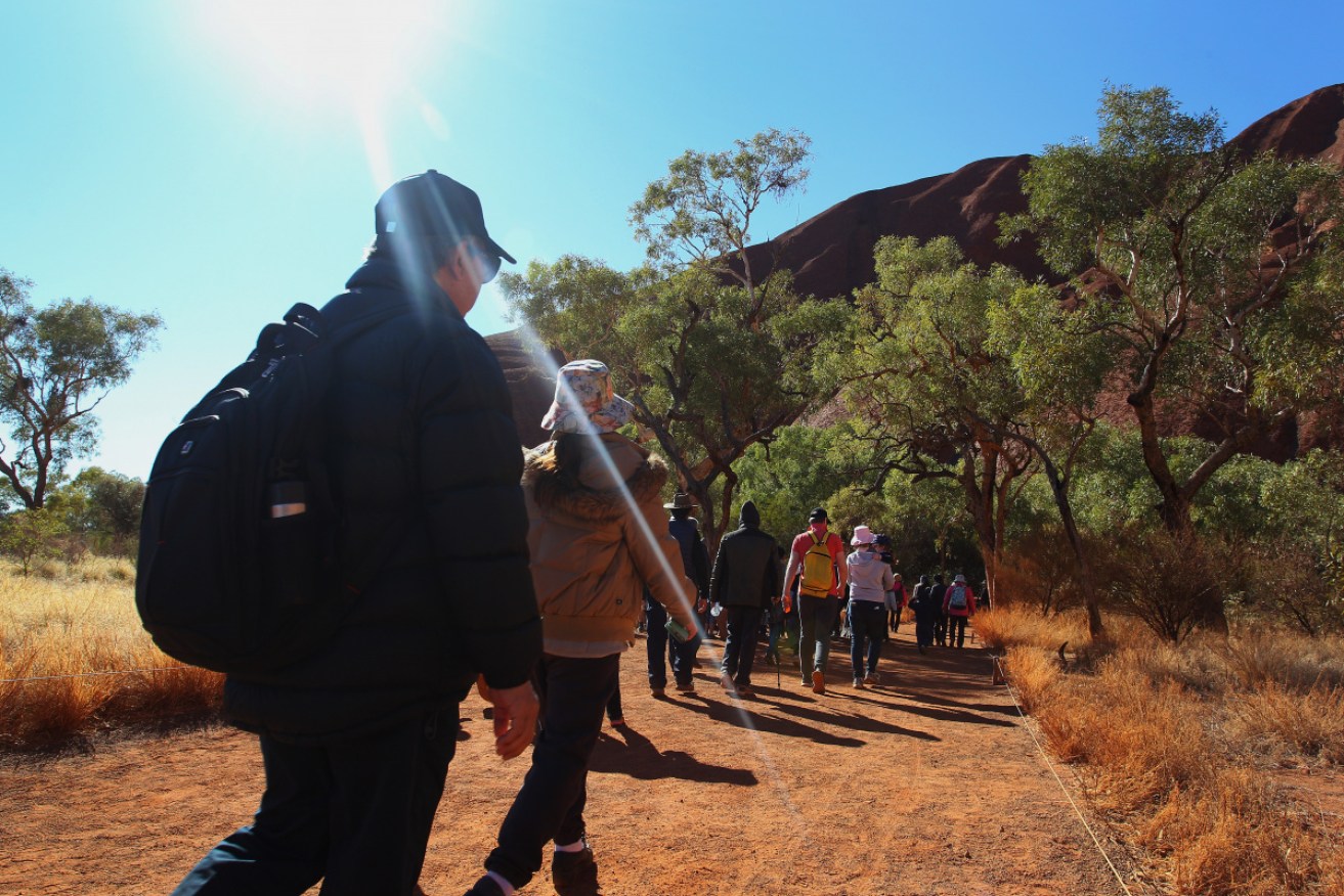 For years, tourists have been asked not to climb Uluru for cultural and safety reasons.