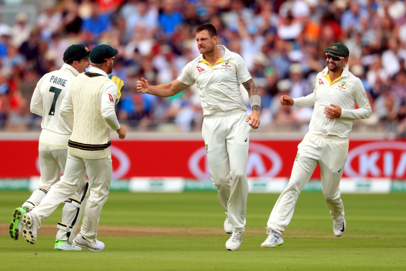 James Pattinson celebrates taking the first England wicket of the First Test. 