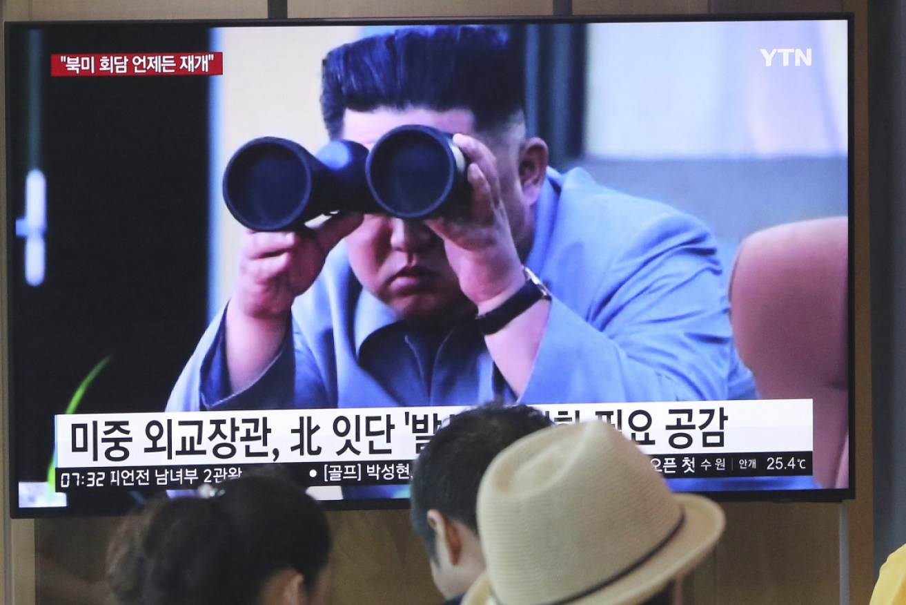 Kim Jong-un watches with 'great satisfaction' the three rounds of weapons tests during the past week.