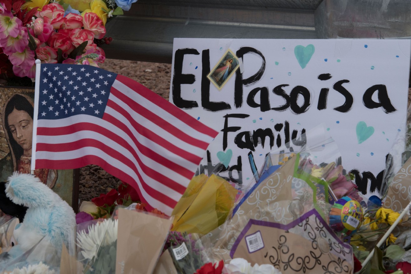A makeshift memorial outside the El Paso Walmart where a gunman killed 20 people at the weekend.
