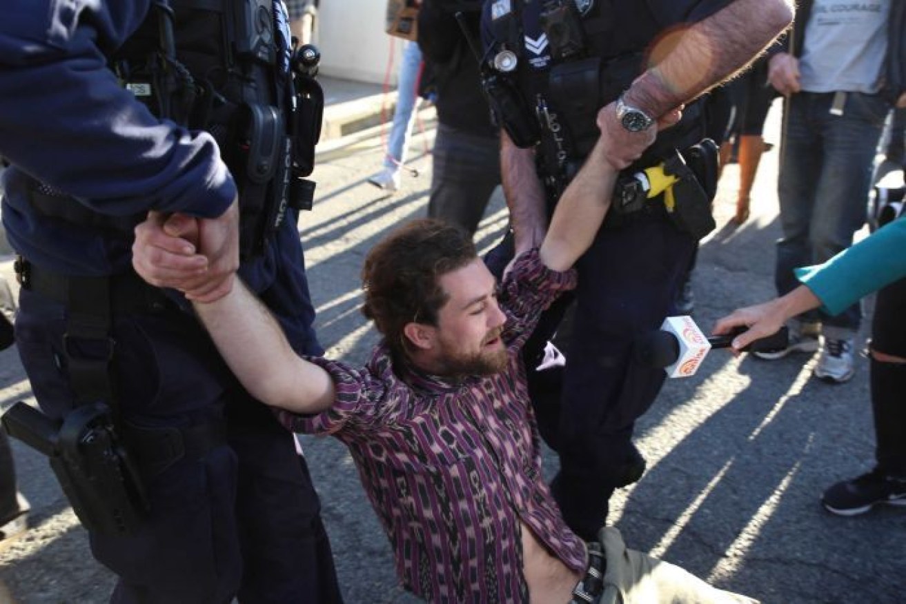 Police made dozens of arrests on Tuesday morning.