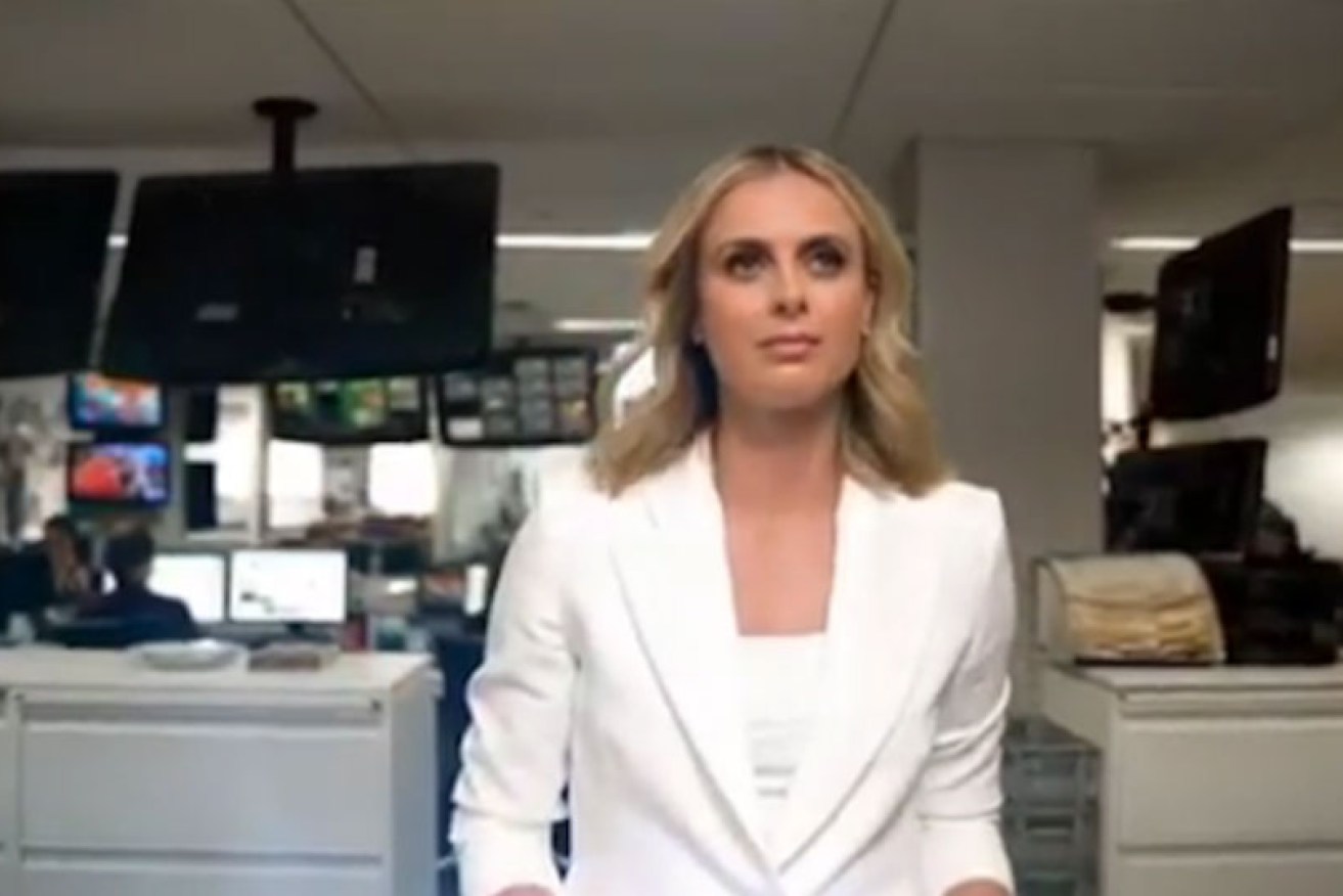 Sylvia Jeffreys strides through the newsroom on August 5's debut of <i>9NewsWatch</i> on Facebook.