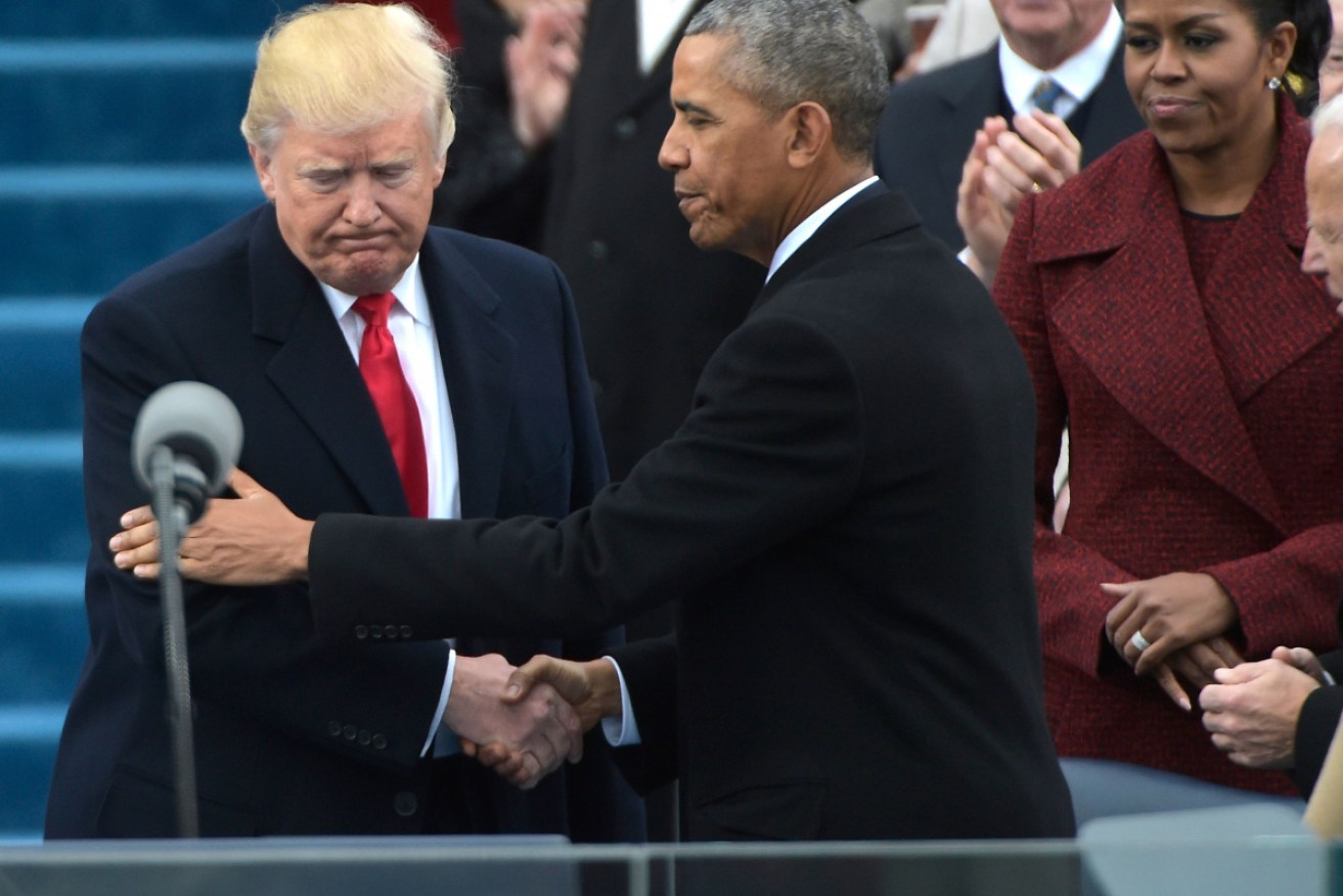 Mr Obama and Mr Trump at Mr Trump's inauguration ceremony in January 2017.