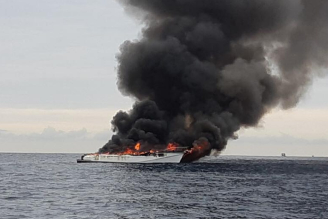 The boat was fully ablaze, and then quickly sank.