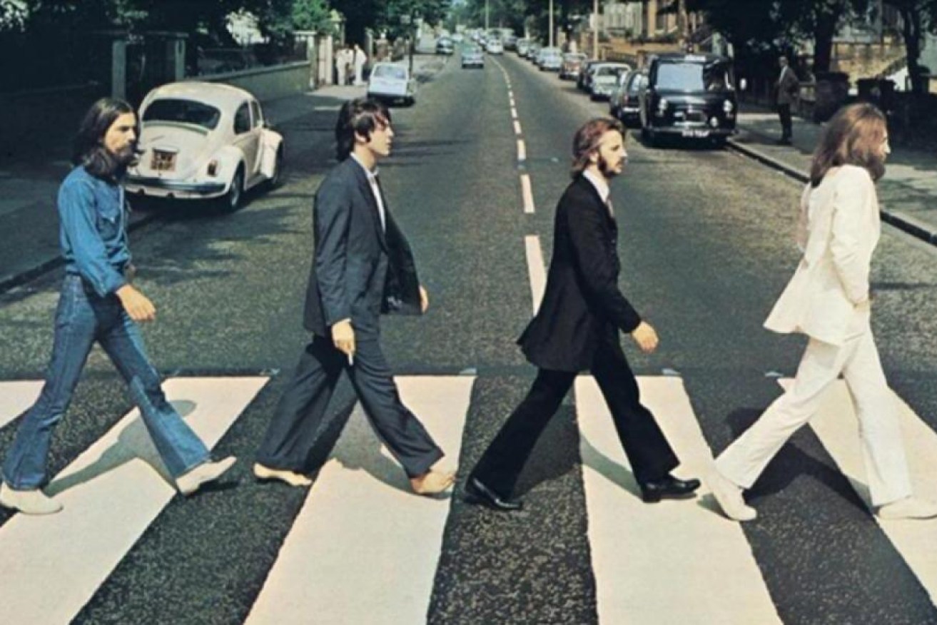 The iconic image of the Beatles crossing Abbey Road taken in 1969. 