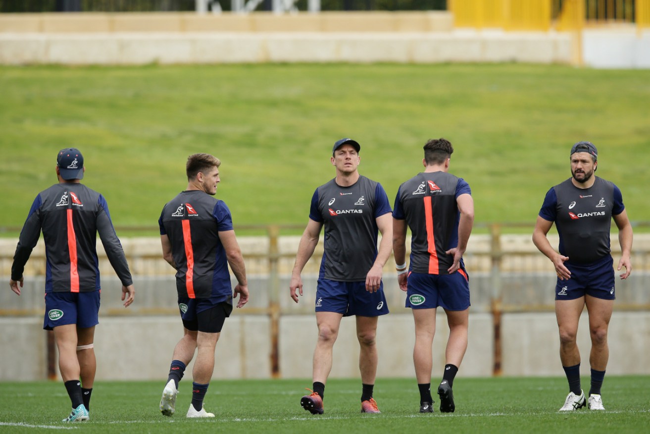 The Wallabies warm up during a training session at the WACA this week. 