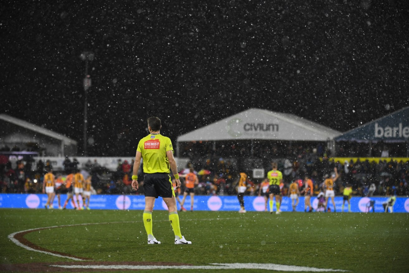 The icy blast produced the AFL's first-ever snow game.